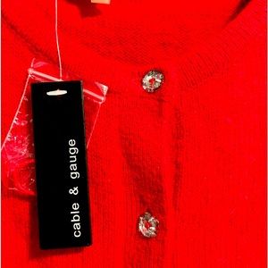 Cable & gauge cardigan sweater.